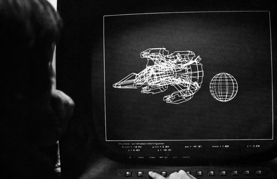 Ron Cobb studies the monitor as Sumner puts the vector Gun
Star through its paces